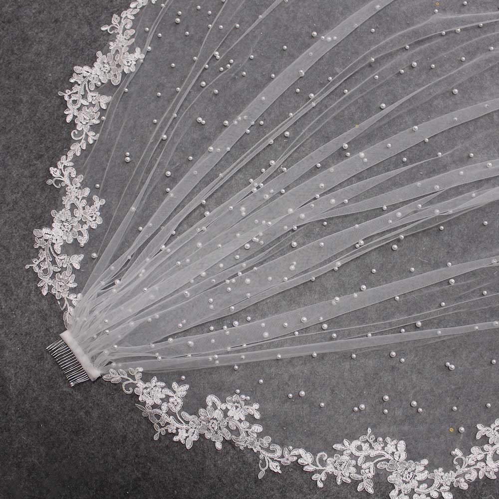 http://www.blissgown.com/cdn/shop/products/high-quality-pearls-wedding-veil-with-lace-appliques-edge-25-meters-long-bridal-veil-with-comb-wedding-accessories-blissgown-340934.jpg?v=1631496117