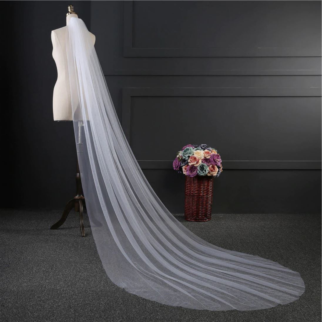 https://www.blissgown.com/cdn/shop/products/ribbon-edge-one-layer-long-with-comb-bridal-veil-wedding-accessories-blissgown-944840_1400x.jpg?v=1631700675